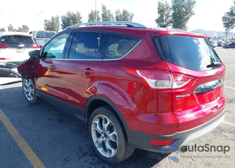 2016 Ford Escape Titanium z USA, uszkodzony, nr VIN 1FMCU0J91GUA39760